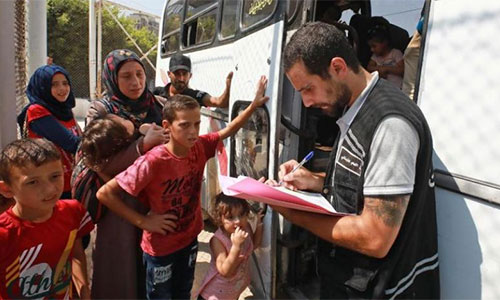 Otro grupo de refugiados sirios regresa a Siria